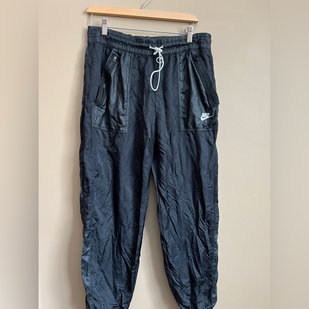 Nike trash bag style pants. Size Large.